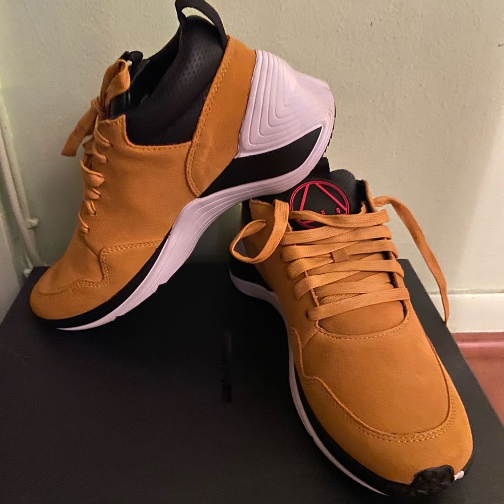 Unisex Alexander McQueen hybrid suede sneakers.